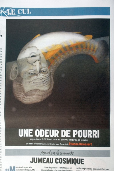 Karikatur von Etienne Delessert, zeigt george w Bush als auf dem rückend schwimmender, also sterbender, fisch